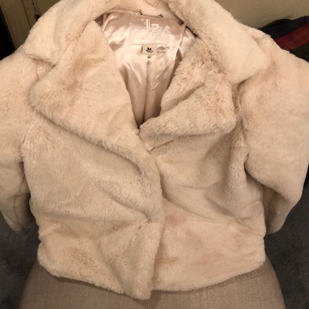 Cream color fax fur,